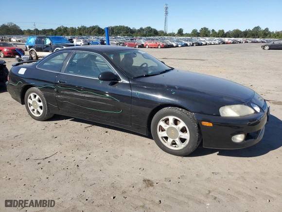 1997 Lexus SC 400 Luxury Sport Cpe with VIN JT8CH32Y5V0052465, listed as a Copart auction lot 74328664 with NaN miles and Salvage Title. Bid and sale history available at carsss.com. Image 4.