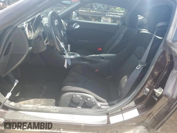 2012 Nissan 370Z Touring with VIN JN1AZ4EH9CM561796, listed as a Copart auction lot 60938314 with 59,011 mi miles and Salvage Title. Bid and sale history available at carsss.com. Image 7.