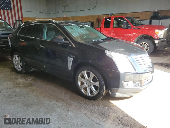 2014 Cadillac SRX Performance Collection z VIN 3GYFNFE31ES627978, wystawiony jako Copart lot #55437185 z przebiegiem 141 759 mil mil oraz Czysty tytuł • Clean title. Historia ofert i sprzedaży dostępna na DreamBid. Obrazek 4.