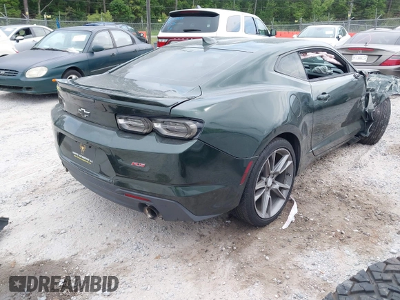 2020 Chevrolet Camaro 1LT with VIN 1G1FB1RS6L0125323, listed as a IAAI auction lot 42101034 with 124,474 mi miles and . Bid and sale history available at DreamBid. Image 4.