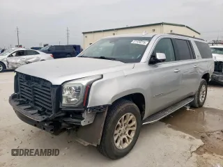 2019 GMC Yukon XL SLT with VIN 1GKS2GKC3KR343794, listed as a Copart auction lot 51124775 with 131,684 mi miles and Salvage title. Bid and sale history available at DreamBid. Image 1.