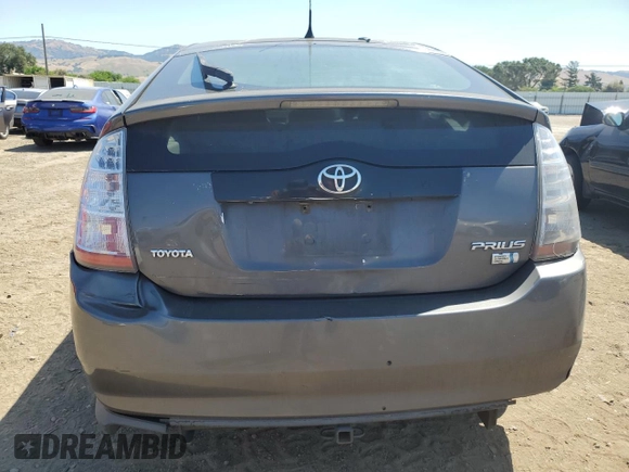 2007 Toyota Prius with VIN JTDKB20U173202615, listed as a Copart auction lot 61873945 with 219,911 mi miles and Salvage title. Bid and sale history available at DreamBid. Image 6.