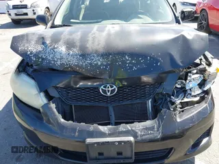 2009 Toyota Corolla with VIN JTDBL40E199094885, listed as a IAAI auction lot 41840789 with 106,498 mi miles. Bid and sale history available at carsss.com. Image 10.