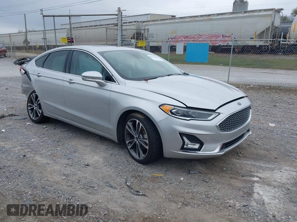 2019 Ford Fusion Titanium with VIN 3FA6P0K96KR120749, listed as a IAAI auction lot 40737085 with 118,376 mi miles and . Bid and sale history available at DreamBid. Image 1.