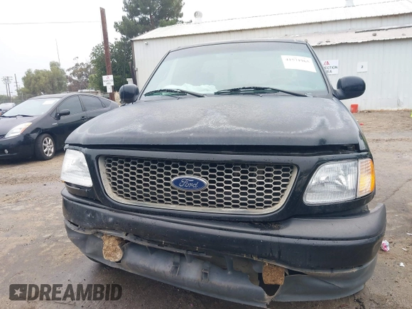 2001 Ford F-150 XL z VIN 1FTRX17L81NB78221, wystawiony jako IAAI lot #41571965 z przebiegiem 171 094 mil mil oraz . Historia ofert i sprzedaży dostępna na DreamBid. Obrazek 12.