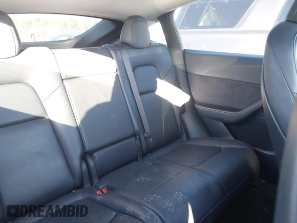2023 Tesla Model Y Long Range with VIN 7SAYGAEE3PF753657, listed as a IAAI auction lot 41668917 with 33,301 mi miles and . Bid and sale history available at DreamBid. Image 8.