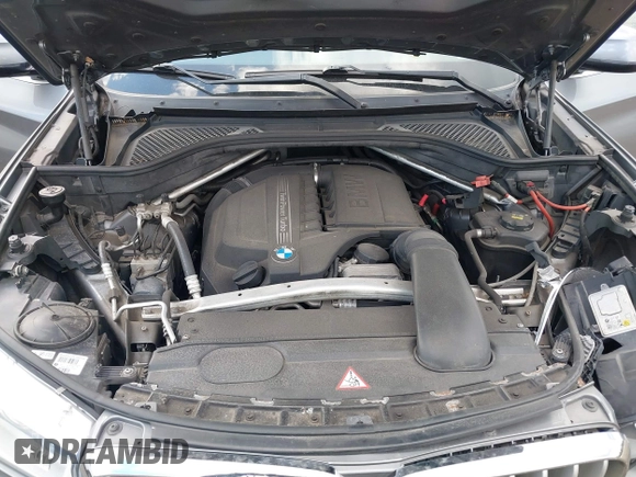 2014 BMW X5 xDrive35i with VIN 5UXKR0C52E0K50710, listed as a IAAI auction lot 40529606 with 114,307 mi miles. Bid and sale history available at carsss.com. Image 10.