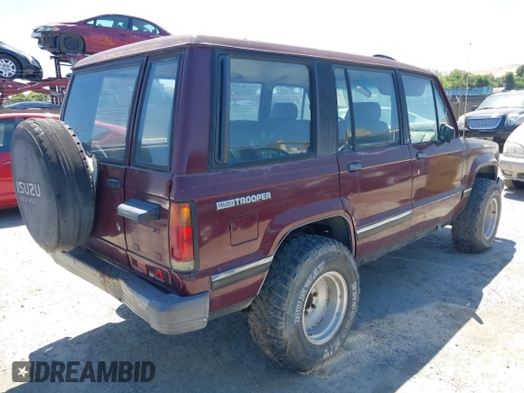 1991 Isuzu Trooper z VIN JACCH58R8M7904079, wystawiony jako IAAI lot #42303036 z przebiegiem 244 672 mil mil oraz . Historia ofert i sprzedaży dostępna na DreamBid. Obrazek 4.