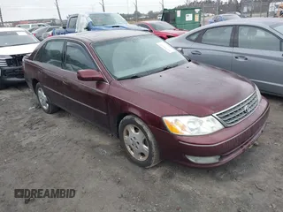 2003 Toyota Avalon XL with VIN 4T1BF28BX3U330679, listed as a IAAI auction lot 41758153 with 310,715 mi miles and . Bid and sale history available at carsss.com. Image 1.
