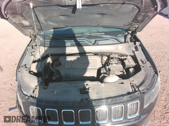 2017 Jeep Compass Sport z VIN 3C4NJCABXHT643474, wystawiony jako Copart lot #53654615 z przebiegiem 79 855 mil mil oraz Szkoda całkowita • Salvage title. Historia ofert i sprzedaży dostępna na DreamBid. Obrazek 13.