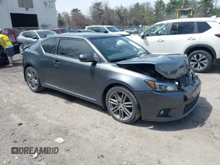2012 Scion tC with VIN JTKJF5C79C3043336, listed as a IAAI auction lot 42085188 with 127,844 mi miles. Bid and sale history available at carsss.com. Image 1.