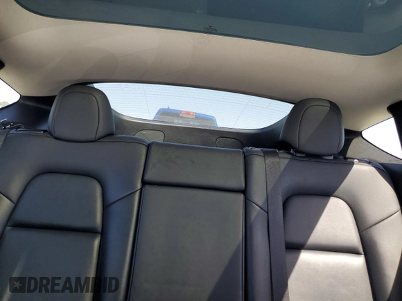 2022 Tesla Model Y Long Range z VIN 7SAYGAEE6NF492070, wystawiony jako Copart lot #52032415 z przebiegiem 143 732 mil mil oraz Szkody całkowita. Historia ofert i sprzedaży dostępna na DreamBid. Obrazek 10.