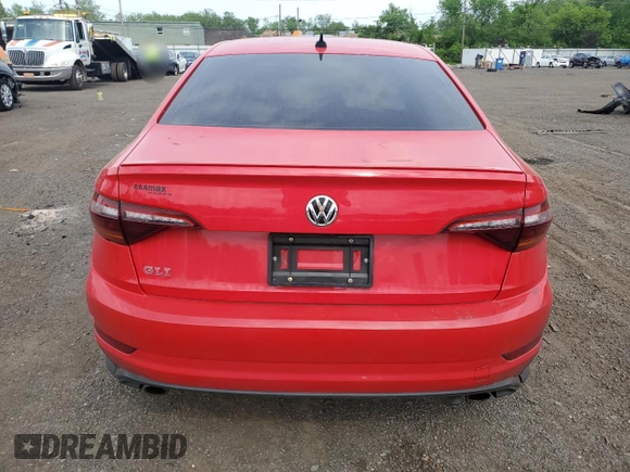 2019 Volkswagen Jetta GLI S z VIN 3VW5T7BU5KM148082, wystawiony jako Copart lot #56562505 z przebiegiem 100 026 mil mil oraz Szkody całkowita. Historia ofert i sprzedaży dostępna na DreamBid. Obrazek 6.