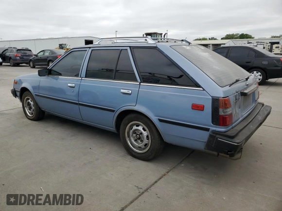 1985 Nissan Sentra z VIN JN1PB15S6FU172045, wystawiony jako Copart lot #54384475 z przebiegiem 134 117 mil mil oraz Szkoda całkowita • Salvage title. Historia ofert i sprzedaży dostępna na DreamBid. Obrazek 2.