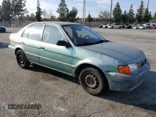 1995 Toyota Tercel DX z VIN JT2EL56E2S7019018, wystawiony jako Copart lot #84929224 z przebiegiem 241 078 mil mil oraz Szkoda całkowita • Salvage title. Historia ofert i sprzedaży dostępna na DreamBid. Obrazek 4.