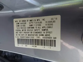 2016 Acura TLX with VIN 19UUB1F34GA013505, listed as a IAAI auction lot 41671913 with 123,164 mi miles. Bid and sale history available at carsss.com. Image 9.