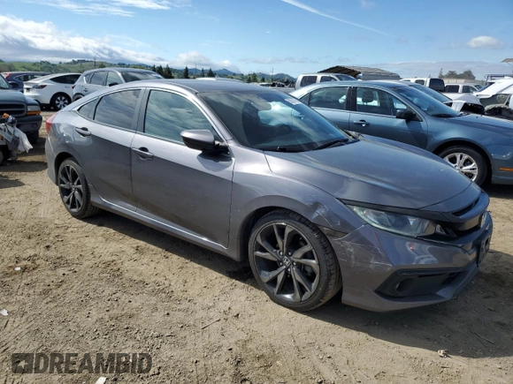 2019 Honda Civic Sport with VIN 2HGFC2F80KH523447, listed as a Copart auction lot 50557765 with 63,969 mi miles and Salvage Title. Bid and sale history available at DreamBid. Image 4.