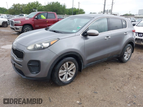 2017 Kia Sportage LX with VIN KNDPM3AC6H7233672, listed as a IAAI auction lot 42215738 with 130,112 mi miles and . Bid and sale history available at carsss.com. Image 2.
