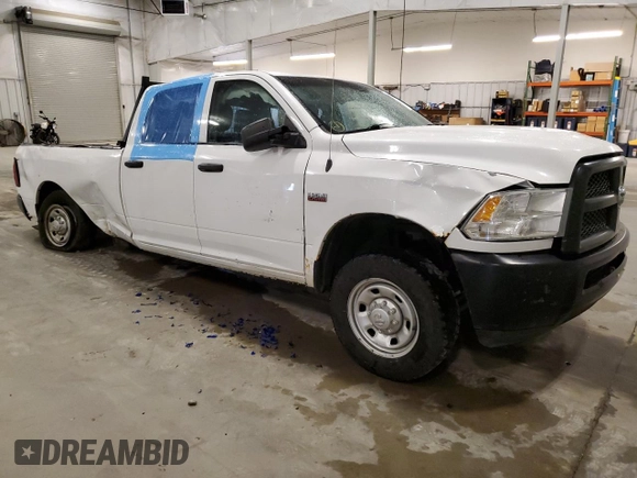 2014 Ram 2500 Tradesman with VIN 3C6TR4HT9EG307685, listed as a Copart auction lot 57306195 with 184,790 mi miles and Salvage title. Bid and sale history available at DreamBid. Image 4.