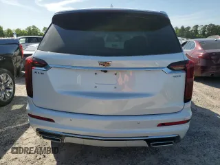 2024 Cadillac XT6 FWD Premium Luxury with VIN 1GYKPCRS1RZ700963, listed as a Copart auction lot 49031094 with 2,977 mi miles and Salvage Title. Bid and sale history available at carsss.com. Image 6.