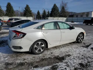2021 Honda Civic Sedan LX with VIN 2HGFC2F63MH550062, listed as a Copart auction lot 86590674 with 56,930 mi miles and Non Repairable. Bid and sale history available at carsss.com. Image 3.