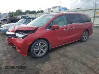 2023 Honda Odyssey Touring with VIN 5FNRL6H81PB020927, listed as a Copart auction lot 63771615 with 31,850 mi miles and Salvage title. Bid and sale history available at DreamBid. Image 1.