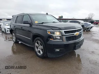 2015 Chevrolet Tahoe LT with VIN 1GNSCBKC2FR632139, listed as a IAAI auction lot 41553087 with 142,775 mi miles and . Bid and sale history available at DreamBid. Image 1.