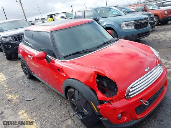 2012 MINI Cooper Hardtop with VIN WMWSU3C58CT542601, listed as a IAAI auction lot 41563923 with 157,569 mi miles. Bid and sale history available at carsss.com. Image 1.