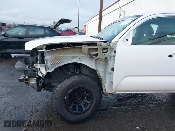 2016 Toyota Tacoma SR with VIN 5TFRX5GN0GX071038, listed as a IAAI auction lot 41176395 with 160,803 mi miles and . Bid and sale history available at DreamBid. Image 18.