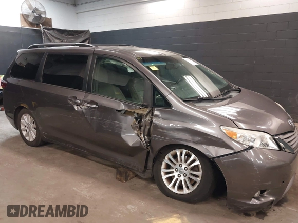 2015 Toyota Sienna XLE with VIN 5TDYK3DC3FS677780, listed as a IAAI auction lot 42155459 with 102,355 mi miles. Bid and sale history available at carsss.com. Image 6.