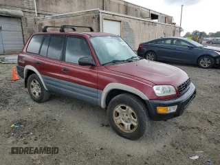 1999 Toyota RAV4 with VIN JT3GP10V4X7043368, listed as a Copart auction lot 74942864 with 367,714 mi miles and Salvage Title. Bid and sale history available at DreamBid. Image 4.