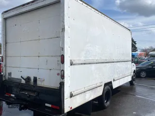 2009 Ford Econoline Cargo with VIN 1FDWE35LX9DA36683, listed as a Copart auction lot 50453625 with 309,448 mi miles and Salvage Title. Bid and sale history available at DreamBid. Image 4.
