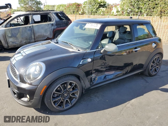 2012 MINI Hardtop S with VIN WMWSV3C59CT387246, listed as a Copart auction lot 61766125 with 155,156 mi miles and Salvage title. Bid and sale history available at DreamBid. Image 1.