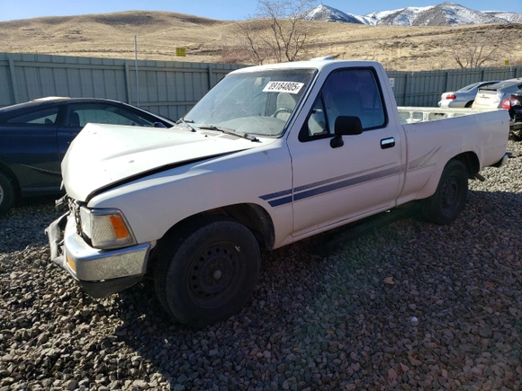 1994 Toyota Pickup DX z VIN JT4RN81P0R5200010, wystawiony jako Copart lot #89184805 z przebiegiem 123 270 mil mil oraz Szkoda całkowita • Salvage title. Historia ofert i sprzedaży dostępna na DreamBid. Obrazek 1.