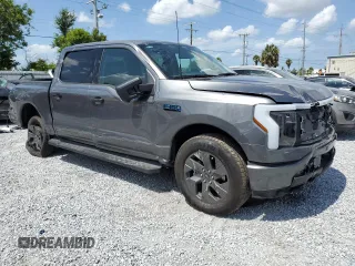 2024 Ford F-150 Lightning XLT with VIN 1FTVW3LK8RWG23783, listed as a Copart auction lot 58359625 with 5,864 mi miles and Salvage title. Bid and sale history available at DreamBid. Image 4.