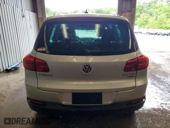 2013 Volkswagen Tiguan SE with VIN WVGBV7AX1DW504036, listed as a Copart auction lot 61126145 with 148,399 mi miles and Salvage title. Bid and sale history available at DreamBid. Image 6.