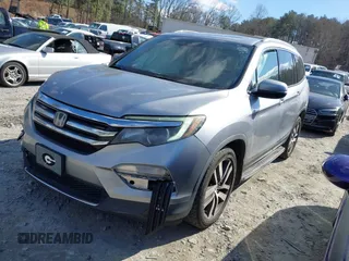 2017 Honda Pilot Touring with VIN 5FNYF6H94HB006873, listed as a IAAI auction lot 41618529 with 154,689 mi miles. Bid and sale history available at carsss.com. Image 17.
