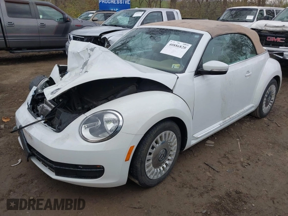 2015 Volkswagen Beetle 1.8T w/Tech with VIN 3VW517AT3FM805868, listed as a IAAI auction lot 40886820 with 113,380 mi miles and . Bid and sale history available at DreamBid. Image 2.