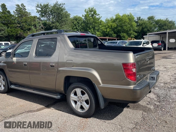 2009 Honda Ridgeline RTL with VIN 2HJYK16539H500759, listed as a Copart auction lot 63874225 with 123,508 mi miles and Clean title. Bid and sale history available at DreamBid. Image 3.