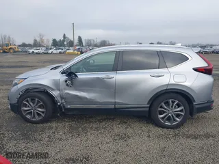 2021 Honda CR-V Touring with VIN 2HKRW2H9XMH212692, listed as a IAAI auction lot 41016640 with 24,149 mi miles. Bid and sale history available at carsss.com. Image 15.