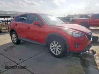 2014 Mazda CX-5 Touring with VIN JM3KE2CY1E0323298, listed as a Copart auction lot 50421685 with 214,739 mi miles and Salvage Title. Bid and sale history available at DreamBid. Image 4.