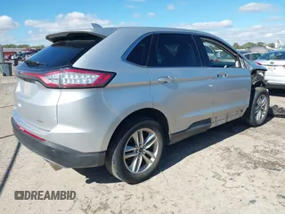 2016 Ford Edge SEL with VIN 2FMPK3J81GBC31668, listed as a IAAI auction lot 40769410 with 125,549 mi miles. Bid and sale history available at carsss.com. Image 4.