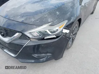 2017 Nissan Maxima SR z VIN 1N4AA6AP1HC405669, wystawiony jako IAAI lot #42157811 z przebiegiem 103 127 mil mil oraz . Historia ofert i sprzedaży dostępna na DreamBid. Obrazek 18.