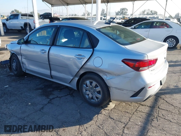 2023 Kia Rio LX with VIN 3KPA24AD1PE599290, listed as a IAAI auction lot 41023283 with 10,027 mi miles and . Bid and sale history available at DreamBid. Image 3.