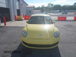 2013 Volkswagen Beetle 2.5L with VIN 3VWHX7AT7DM613197, listed as a IAAI auction lot 41298890 with 130,219 mi miles and . Bid and sale history available at DreamBid. Image 12.