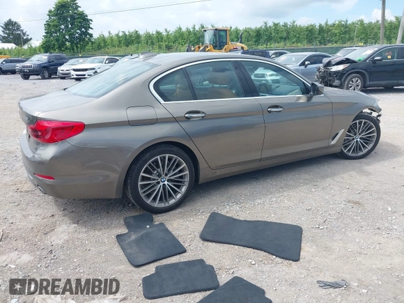 2018 BMW 5 Series 530i xDrive with VIN WBAJA7C55JG909519, listed as a IAAI auction lot 42650263 with 57,077 mi miles and . Bid and sale history available at DreamBid. Image 4.