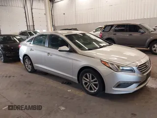 2015 Hyundai Sonata SE z VIN 5NPE24AFXFH048756, wystawiony jako IAAI lot #41792935 z przebiegiem 154 609 mil mil oraz . Historia ofert i sprzedaży dostępna na DreamBid. Obrazek 1.