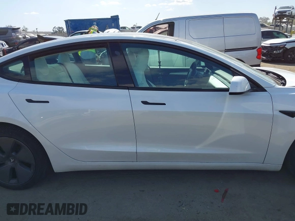 2023 Tesla Model 3 z VIN 5YJ3E1EA2PF465882, wystawiony jako IAAI lot #42257900 z przebiegiem 39 572 mil mil oraz . Historia ofert i sprzedaży dostępna na DreamBid. Obrazek 13.
