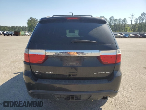2012 Dodge Durango Citadel with VIN 1C4RDJEG3CC301467, listed as a Copart auction lot 52531575 with 270,719 mi miles and Salvage title. Bid and sale history available at DreamBid. Image 6.