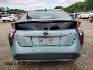 2017 Toyota Prius Two z VIN JTDKBRFU9H3566248, wystawiony jako Copart lot #56851065 z przebiegiem 66 409 mil mil oraz Szkoda całkowita • Salvage title. Historia ofert i sprzedaży dostępna na DreamBid. Obrazek 6.